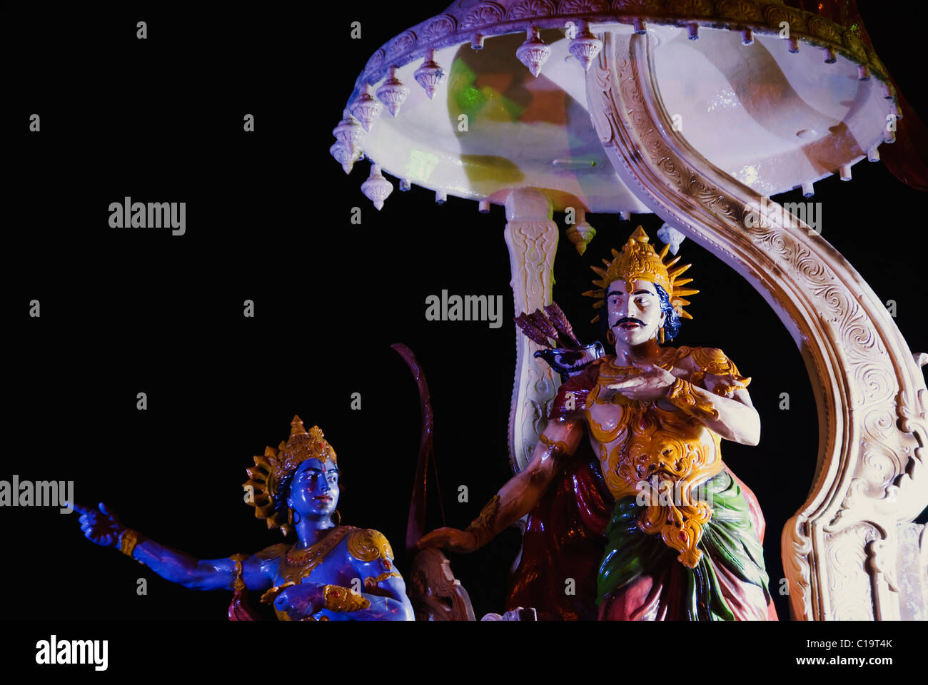 Sculptures of a chariot of lord Krishna and Arjuna at the entrance of Ganga ghat, Muni Ki Reti, Rishikesh, Uttarakhand, India Stock Photo