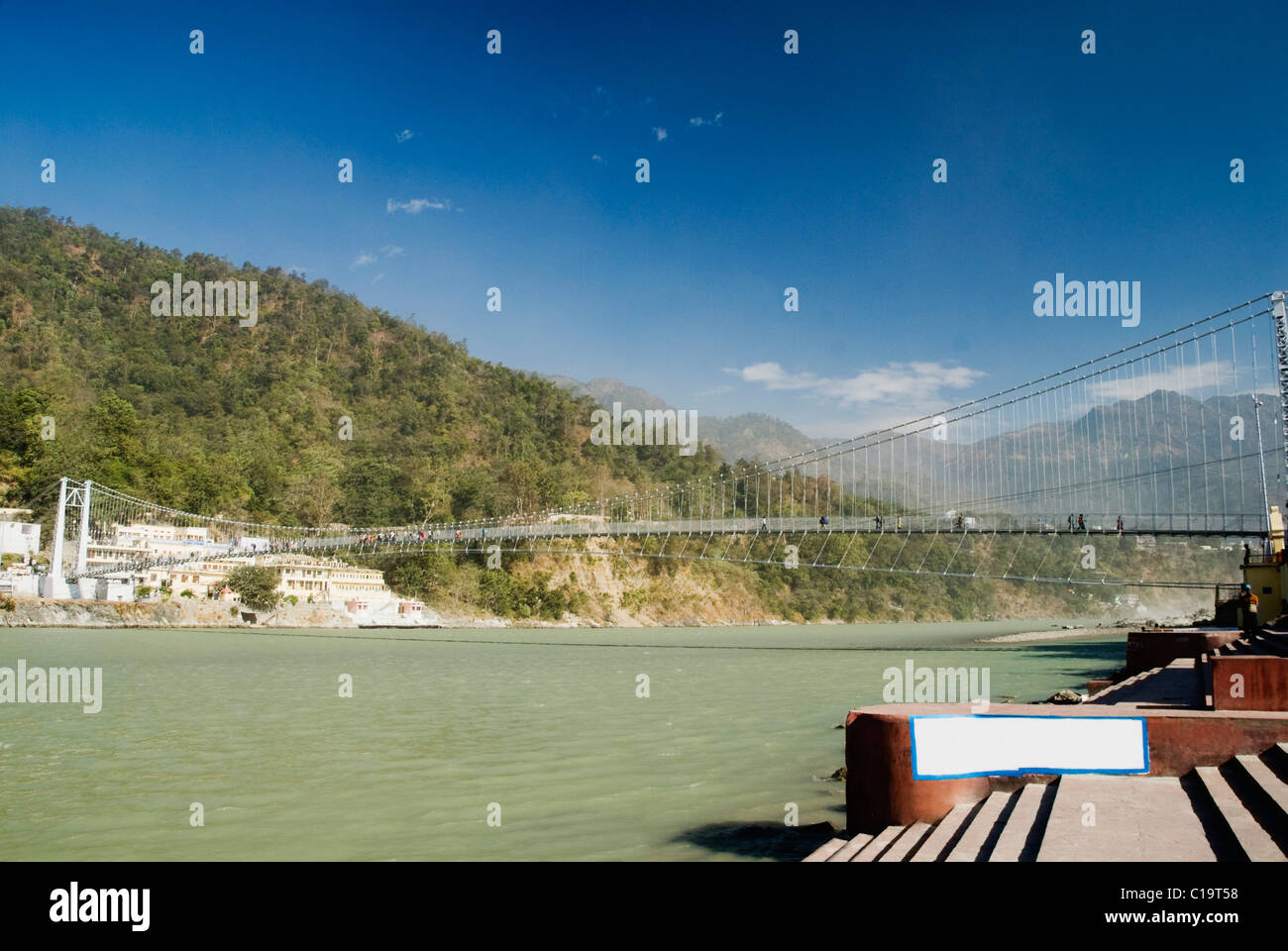 Suspension bridge across a river, Ram Jhula, Ganges River, Rishikesh