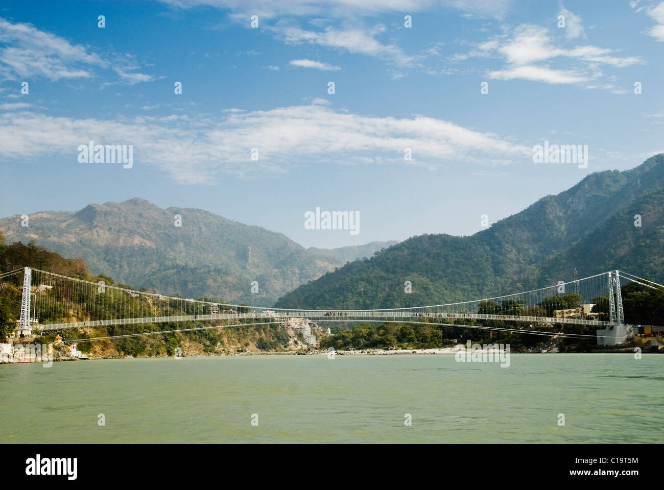 Suspension bridge across a river, Ram Jhula, Ganges River, Rishikesh