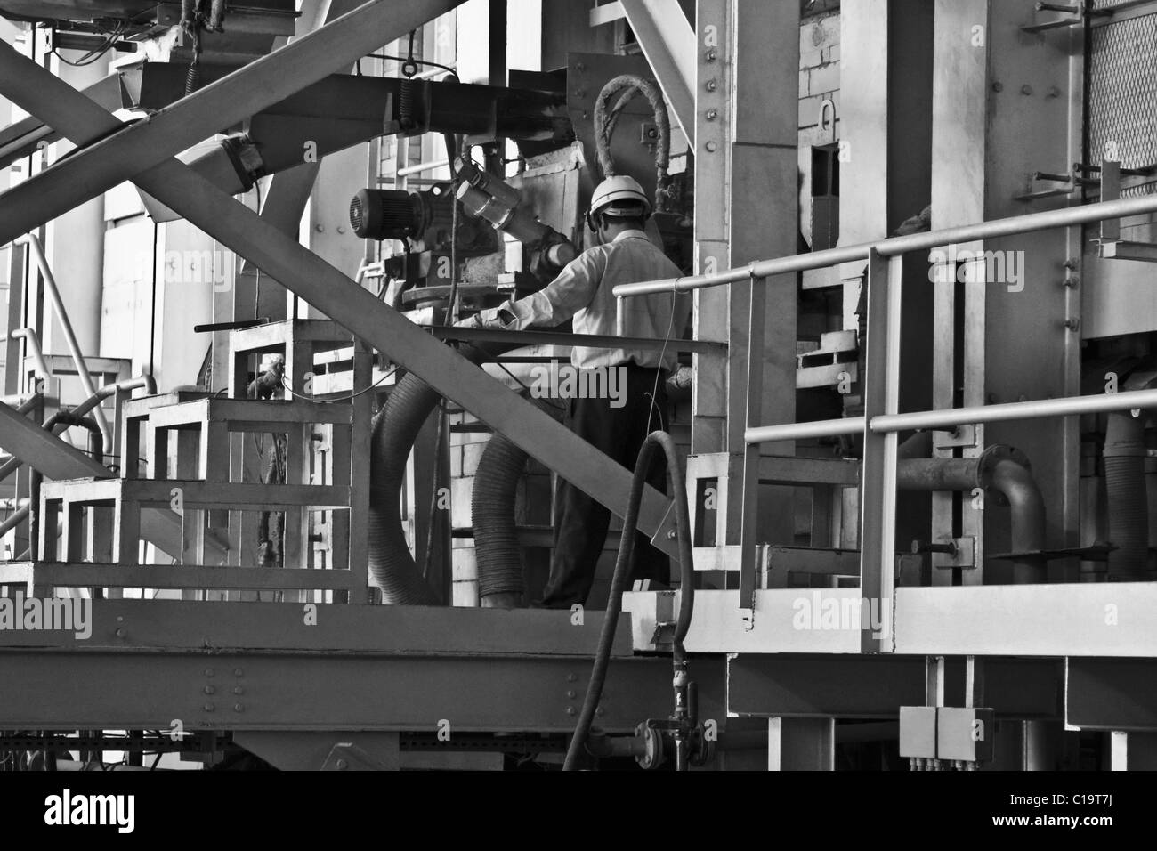Engineer working in a factory, Surya Roshni Limited, Gwalior, Madhya Pradesh, India Stock Photo