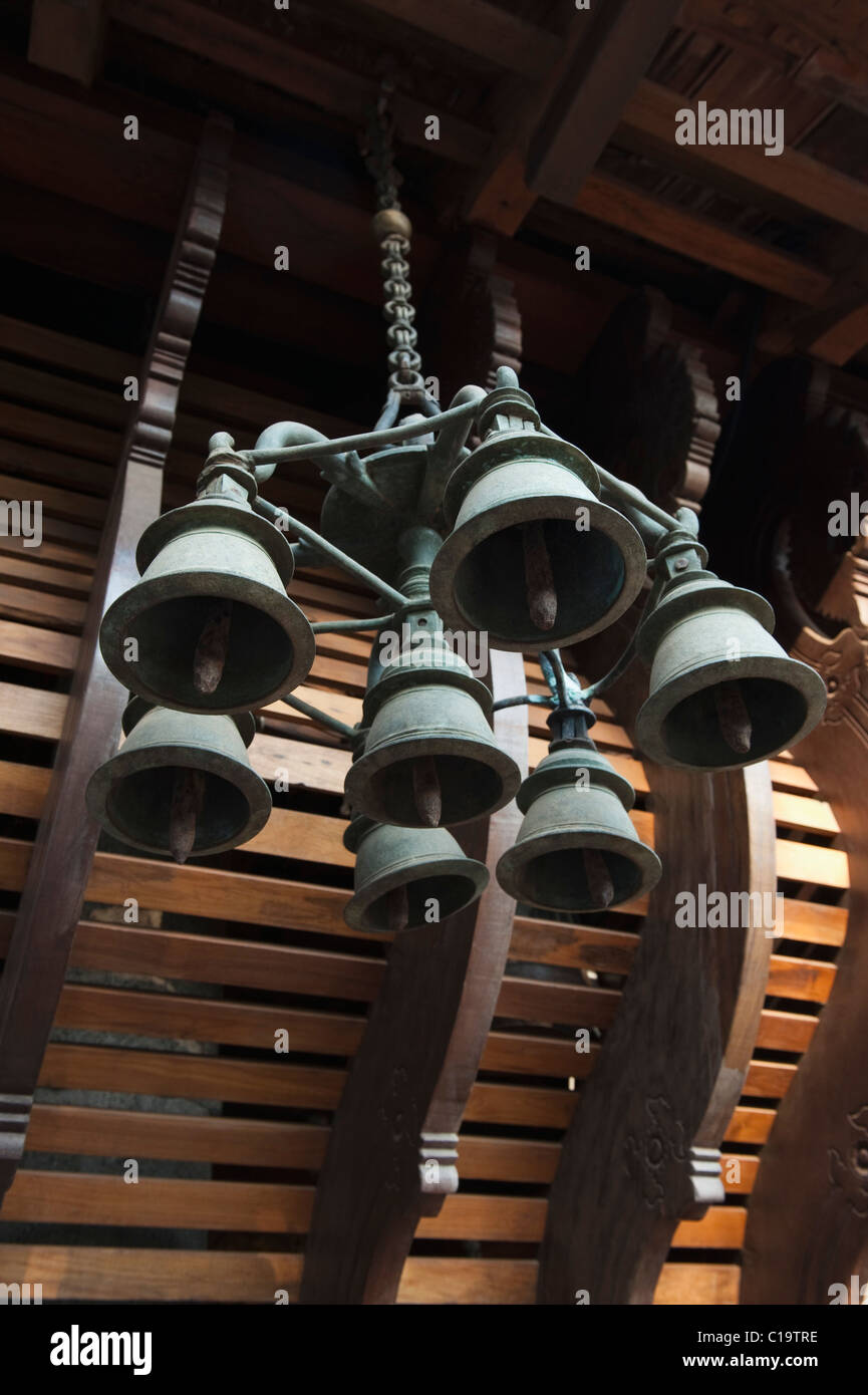 Low angle view of bells hanging in a museum, Folklore Museum, Kochi, Kerala, India Stock Photo