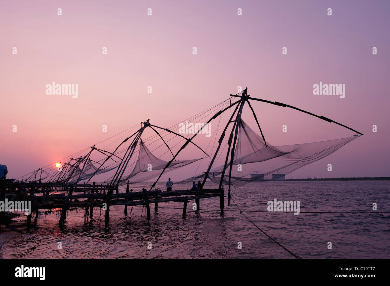 Row of Chinese fishing nets in the sea, Kochi, Kerala, India Stock