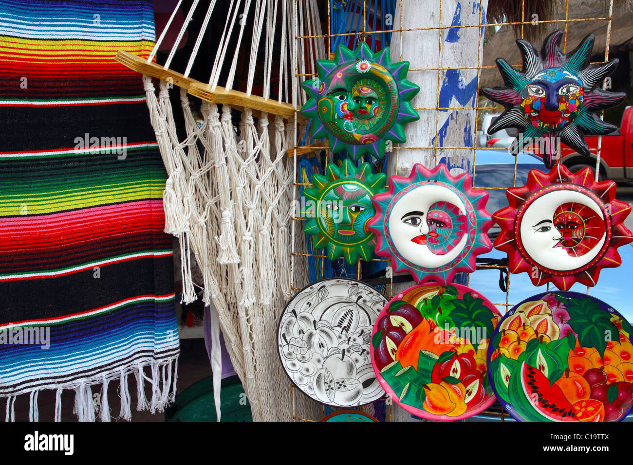Mexican handcrafts hammock serape and ceramics aztec sun indian traditional Stock Photo
