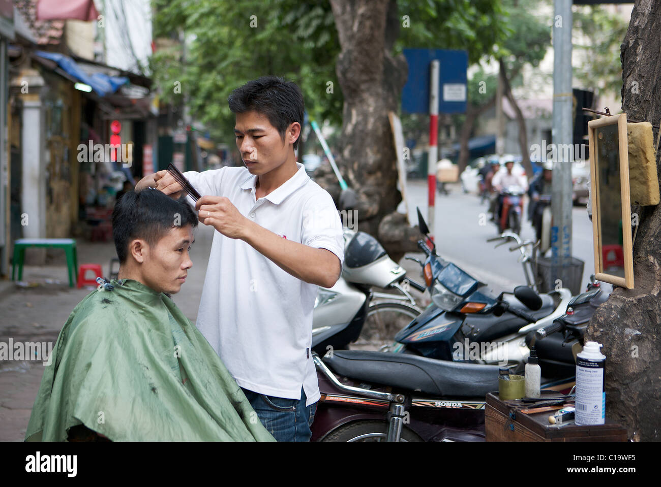 Street haircut, Hanoi, Vietnam Stock Photo - Alamy