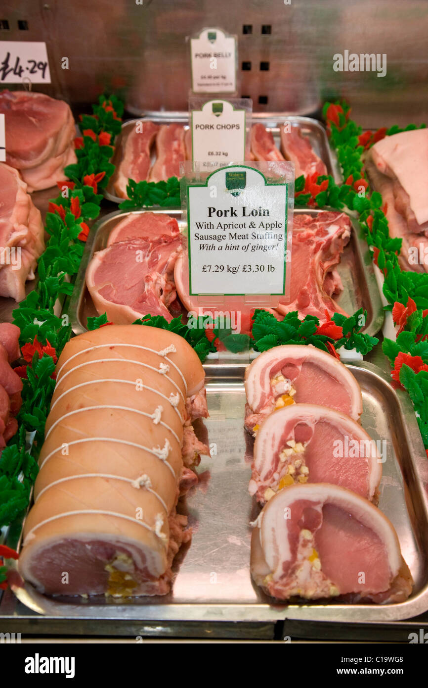 Pork Loin on display in a butchers shop Stock Photo
