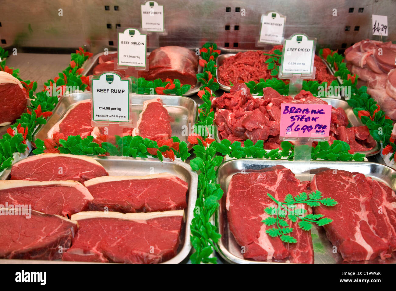 Beef steak on display in a butchers shop Stock Photo Alamy