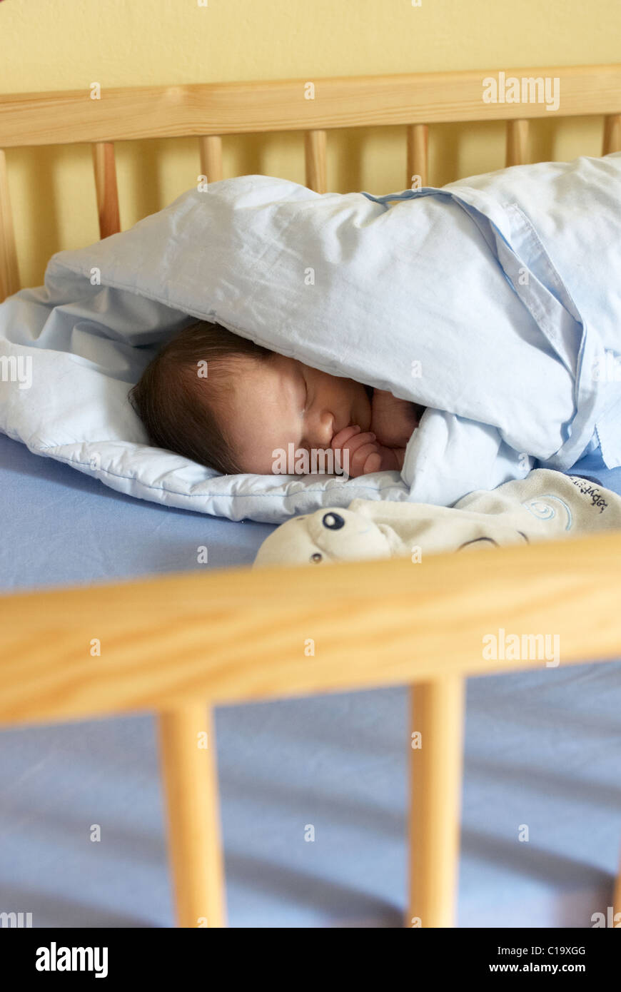 Girl sleeping in cot bed hi-res stock photography and images - Alamy