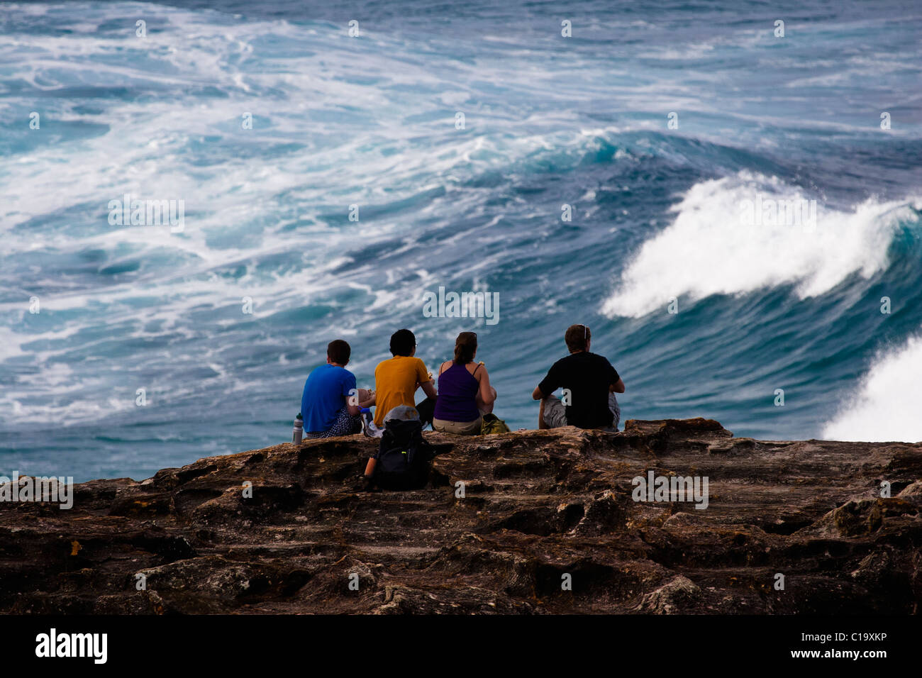 People watching the surf at North Gorge, North Stradbroke Island Stock Photo