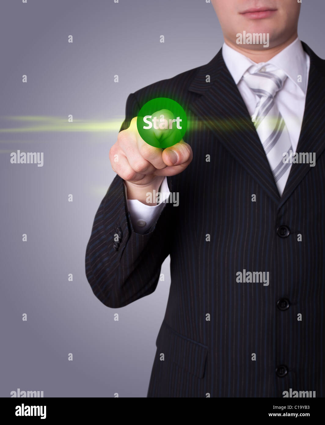 Man hand pressing Start button Stock Photo