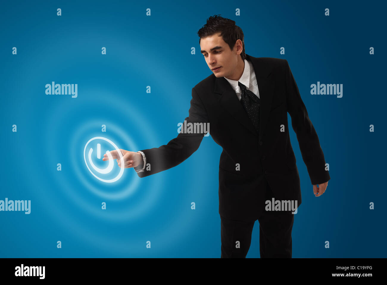 business man pressing ON / OFF button Stock Photo - Alamy