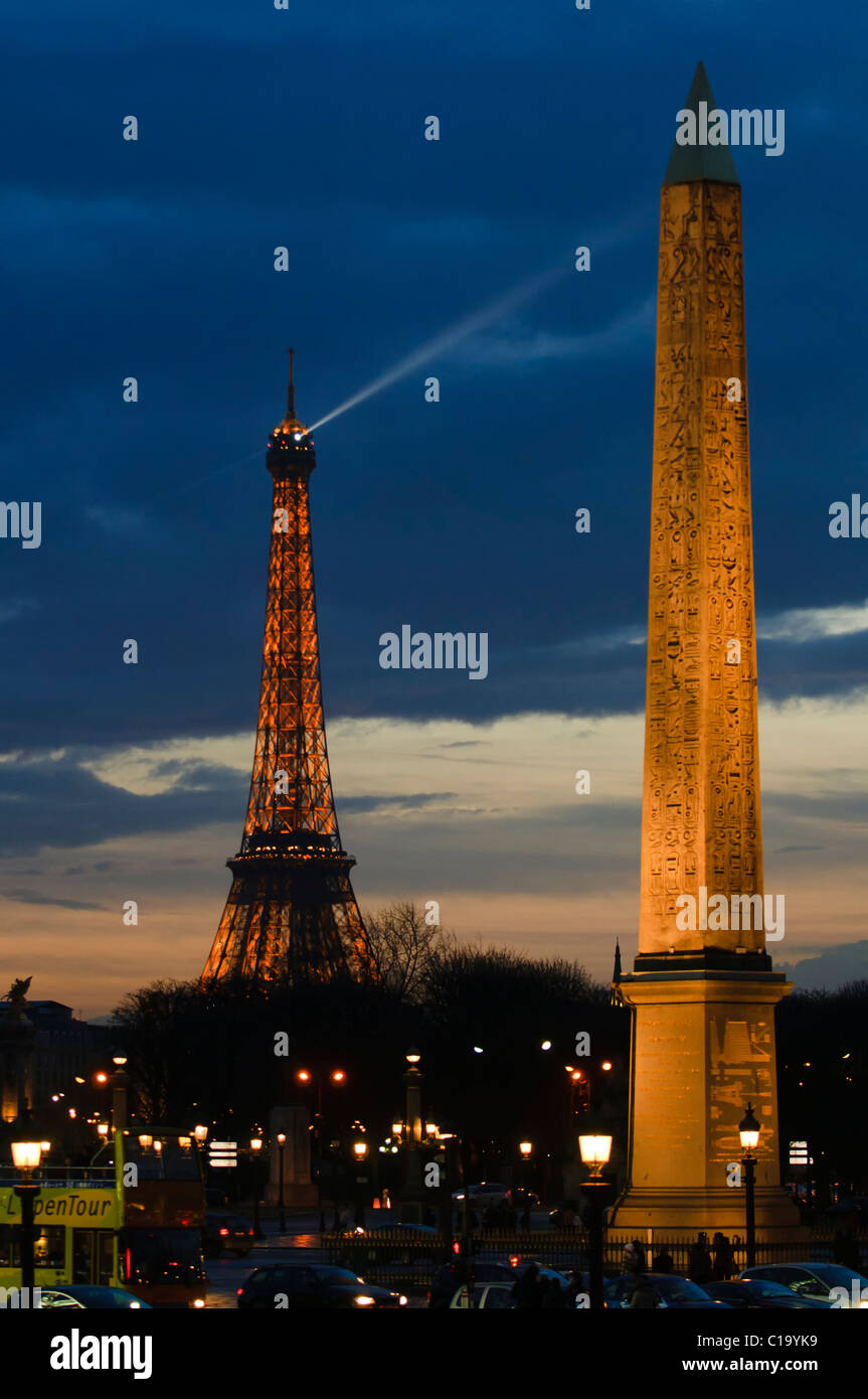 Ray of light from Eiffel Tower to obelisk Stock Photo