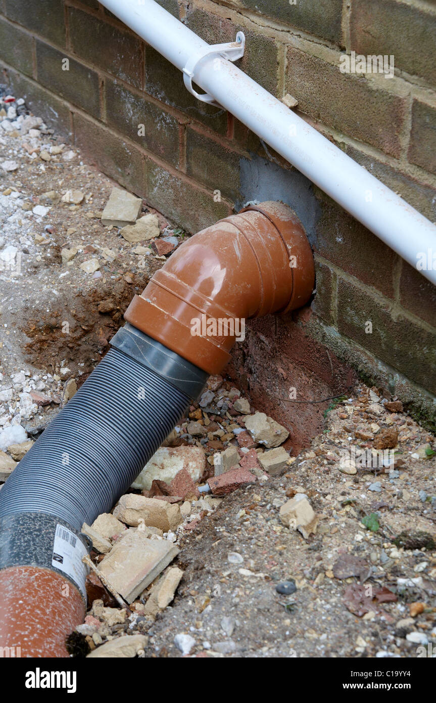 Plastic soil pipe with flexible extension Stock Photo
