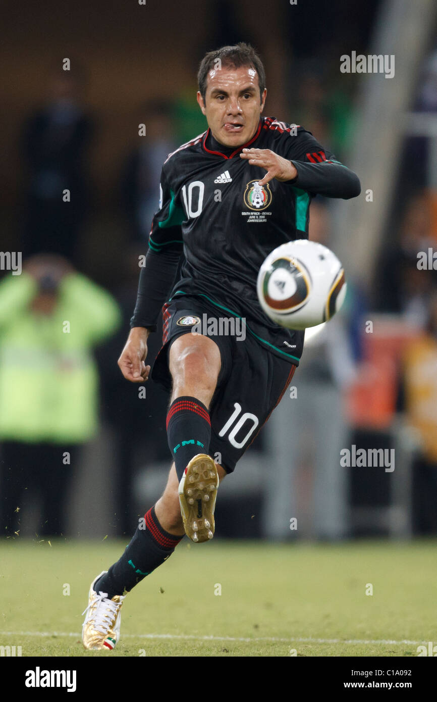 Cuauhtemoc Blanco of Mexico passes the ball against South Africa during the opening match of the 2010 FIFA World Cup tournament. Stock Photo