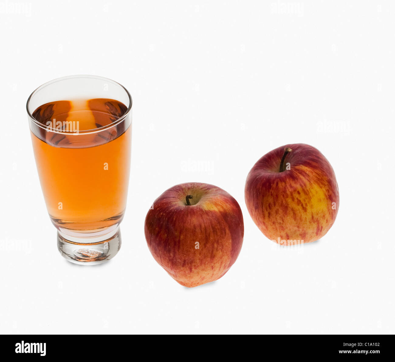 Close-up of apples and a glass of apple juice Stock Photo