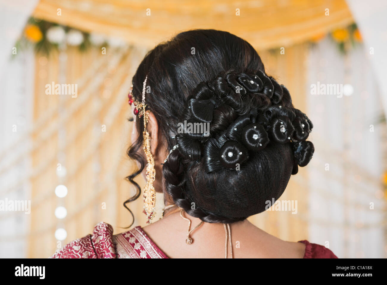 Rear view of a bride in traditional Bengali dress Stock Photo