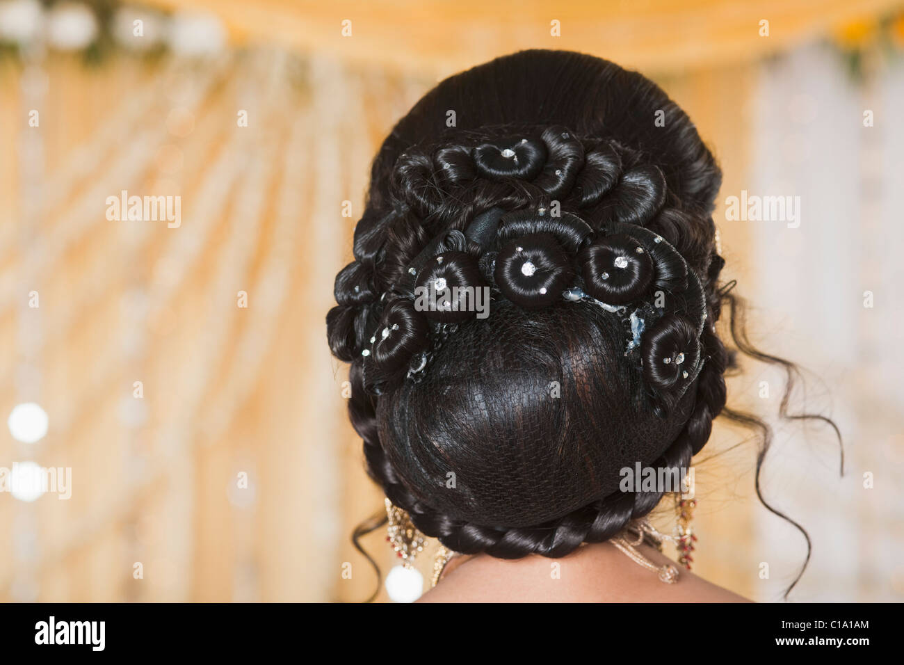 Rear view of a bride in wedding mandap Stock Photo