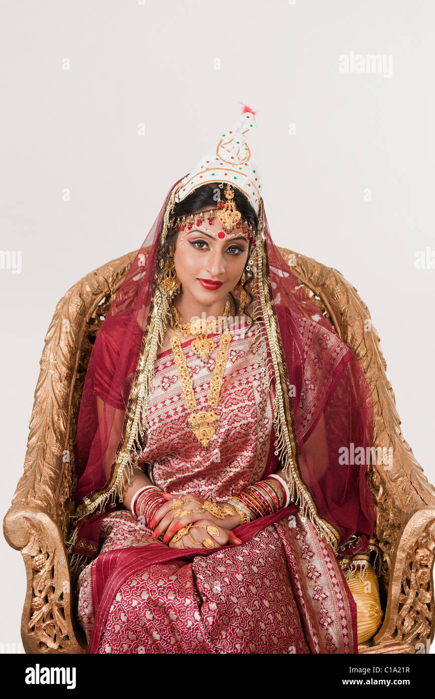 Bride sitting on chair hi-res stock photography and images - Alamy