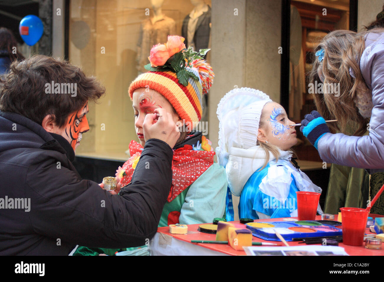 Face painting on the street at Carnevale di Venezia, Italy Stock Photo