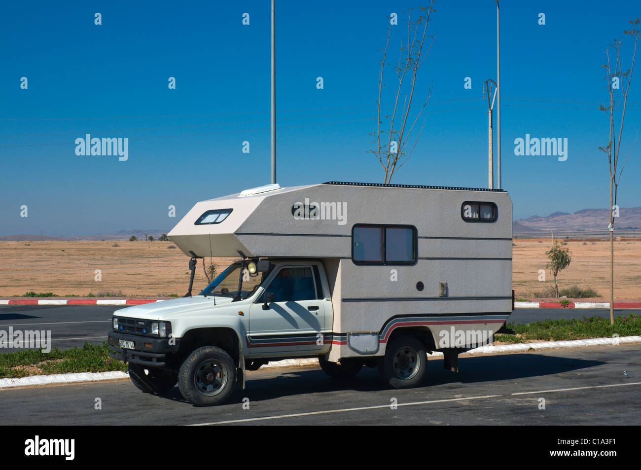 4W recreational vehicle at a rest stop along motorway near Marrakech central Morocco northern Africa Stock Photo