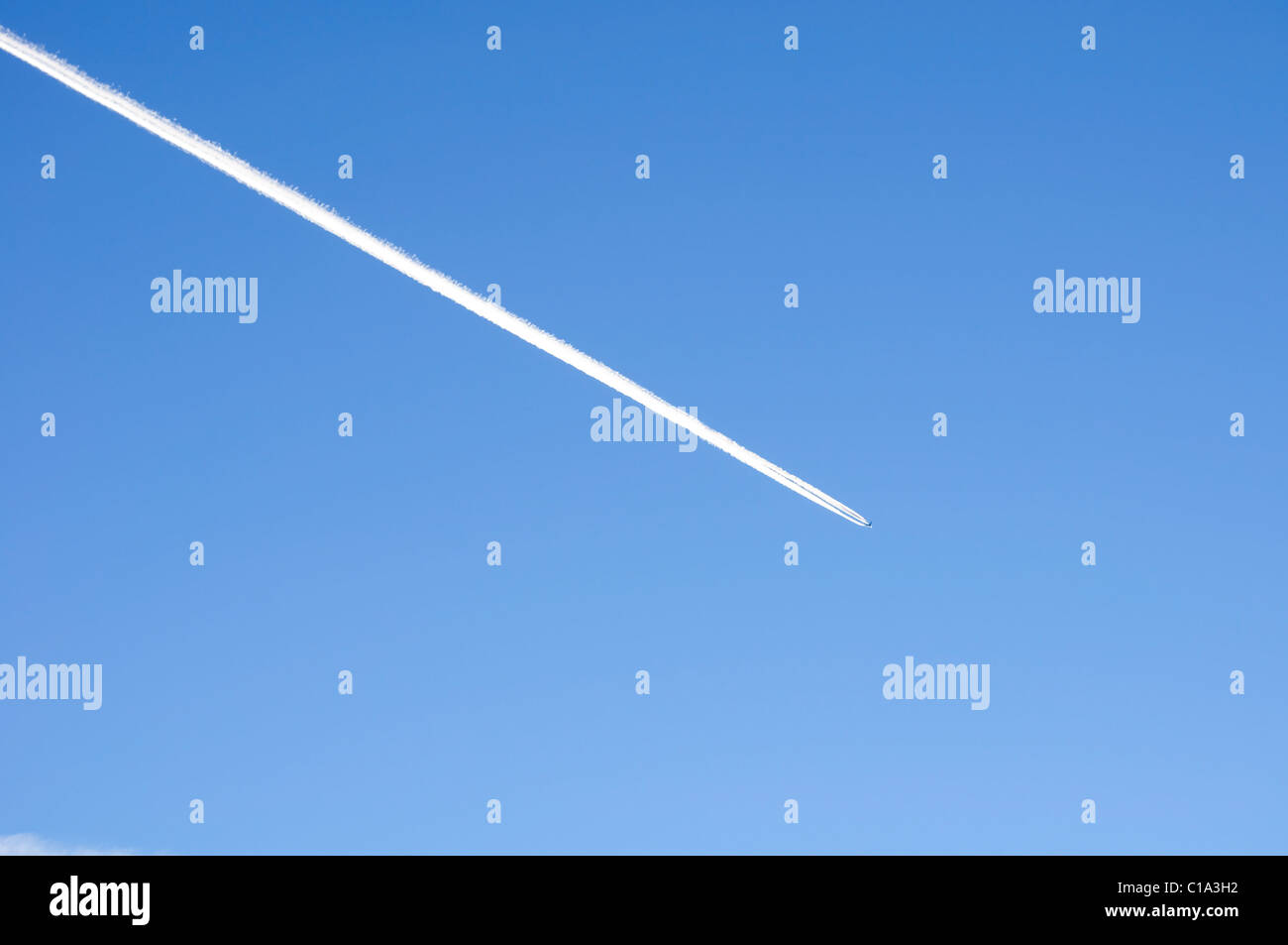 A shot of contrails in the sky Stock Photo