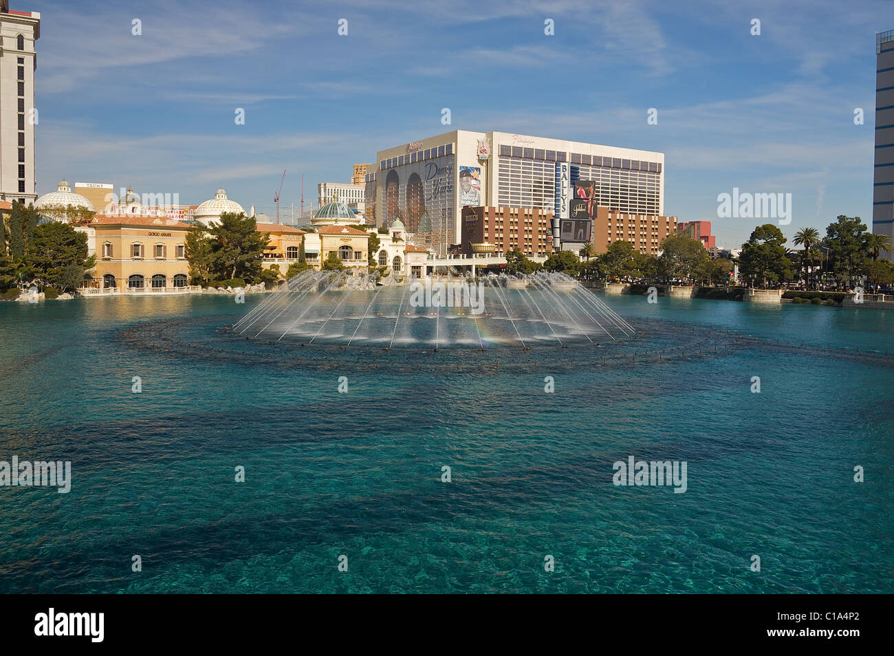 The Bellagio Fountains in Las Vegas, Flamingo Hotel and Bill's Gamblin' Hall in the background Stock Photo