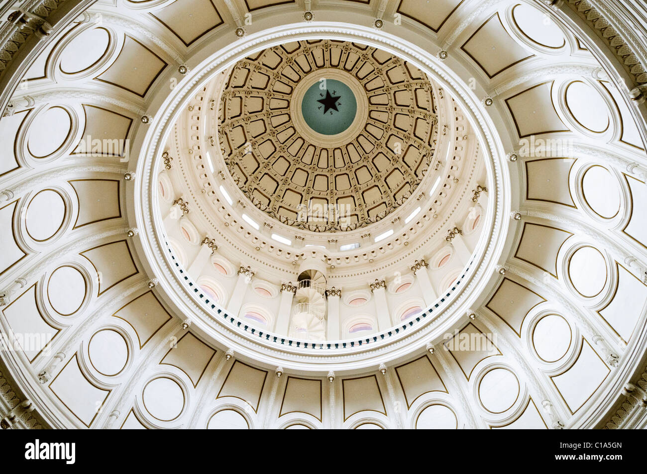 AUSTIN, Texas - The interior dome of the Texas State Capitol building in downtown Austin, Texas. The dome makes the Texas State Capitol building the tallest of the state capitols and the only legislative building taller in the country is the U.S. Capitol in Washington DC. Stock Photo