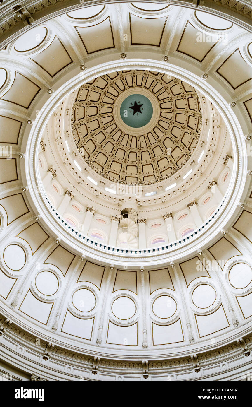 AUSTIN, Texas - The interior dome of the Texas State Capitol building in downtown Austin, Texas. The dome makes the Texas State Capitol building the tallest of the state capitols and the only legislative building taller in the country is the U.S. Capitol in Washington DC. Stock Photo