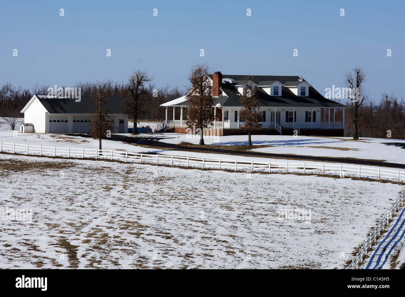 Country home on a snow covered hillside in Arkansas Stock Photo Alamy