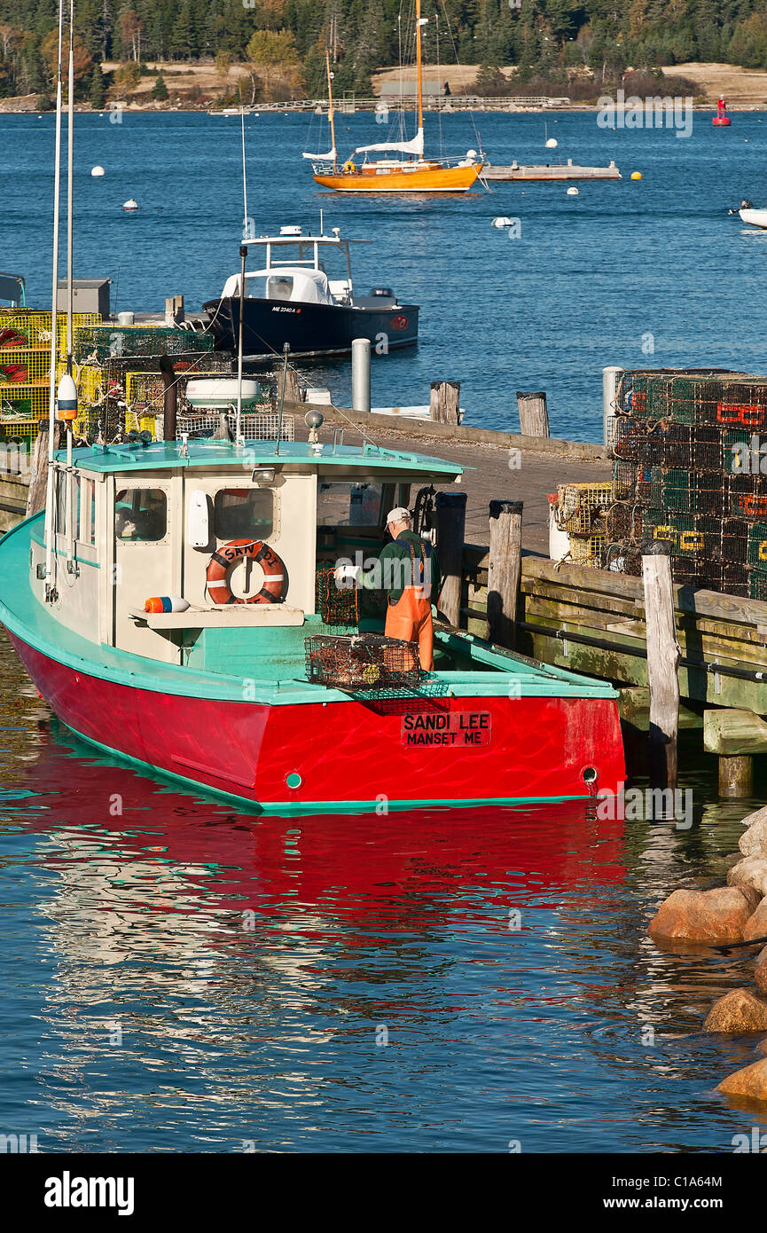 Lobster fisherman working on his boat, Manset, Maine, Me, USA Stock Photo
