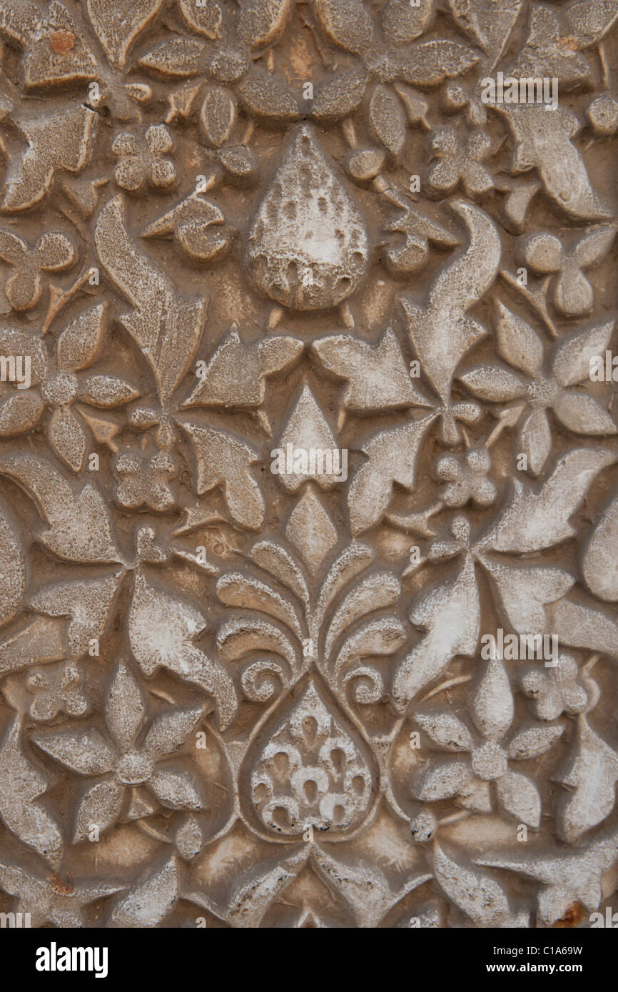 Textured carvings, Arabic themes, in the Alhambra. Granada, Spain Stock Photo