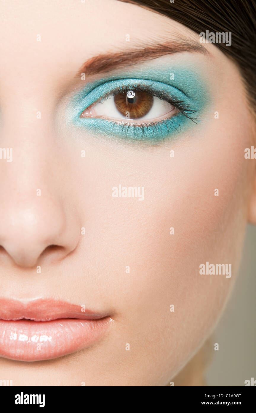 Young woman with turquoise eyeshadow Stock Photo