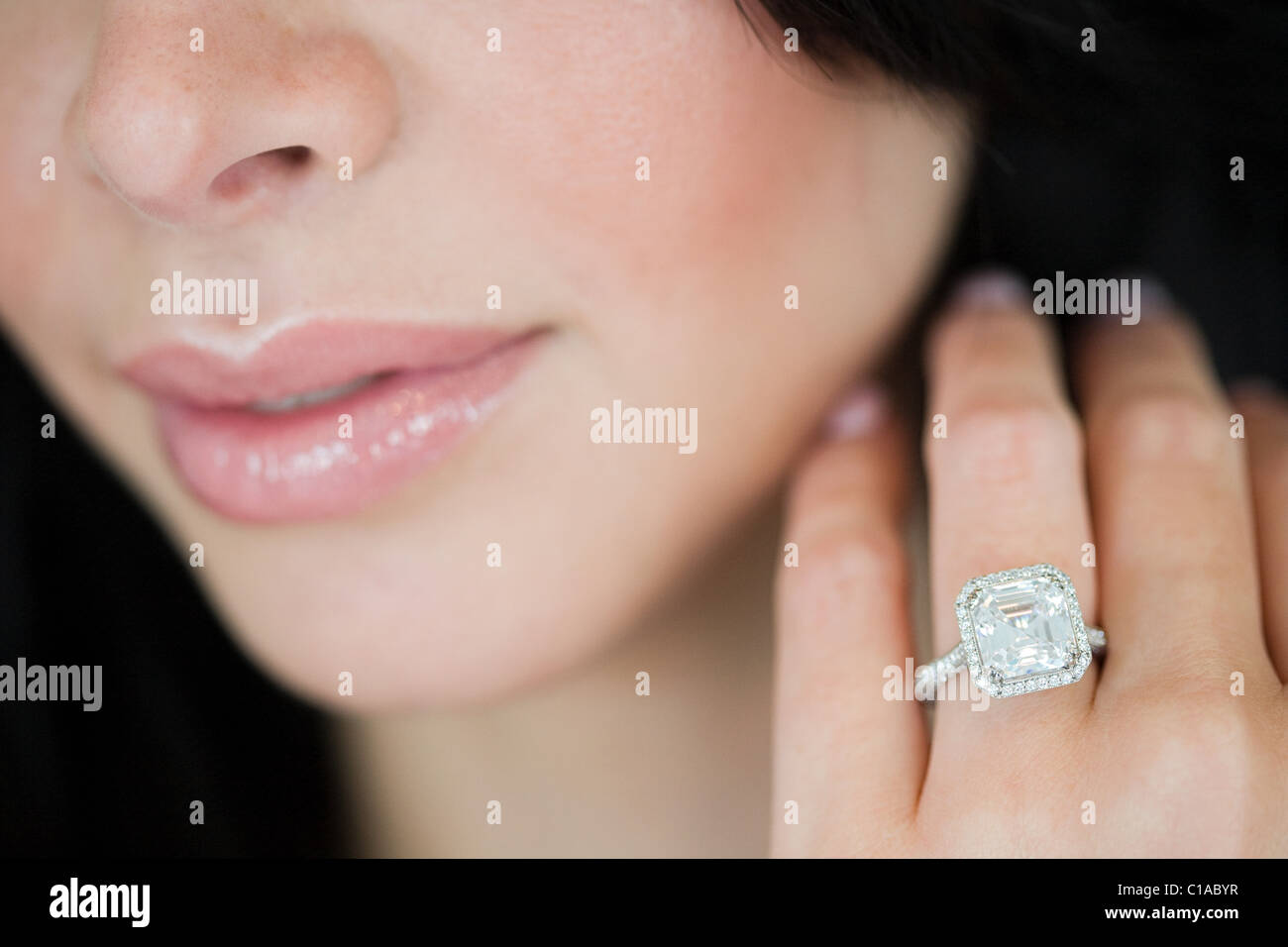 Young woman wearing engagement ring Stock Photo Alamy