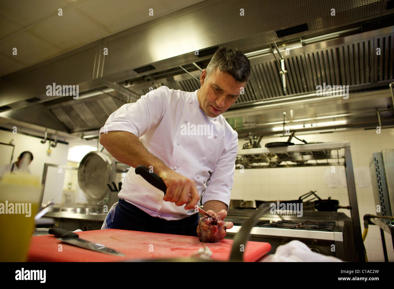 Chef Martin Wishart cooking in his restaurant. Stock Photo