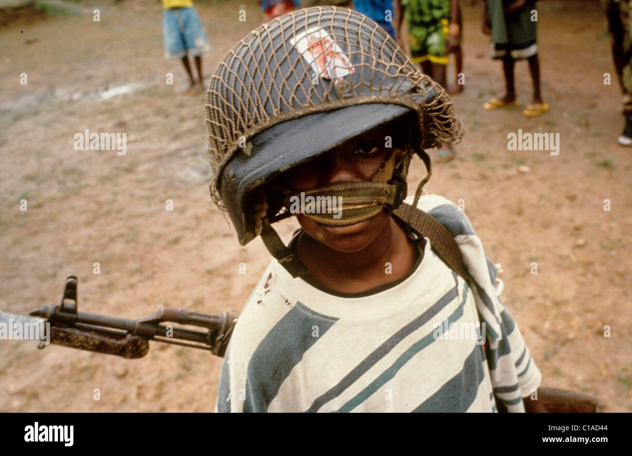 Child soldier of the RUF at a checkpoint near Lunsar  Sierra Leone - 29.11.07 Stock Photo