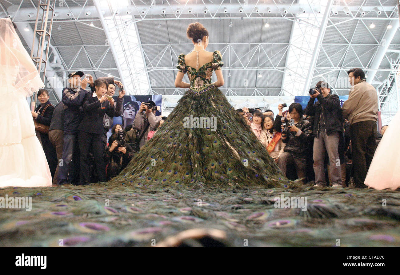 Peacock Dress A Model Shows Off A Wedding Dress Made Of 2009