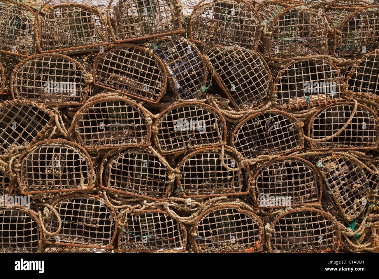 Stacks of commercial crab fishing baskets, Portugal Stock Photo Alamy