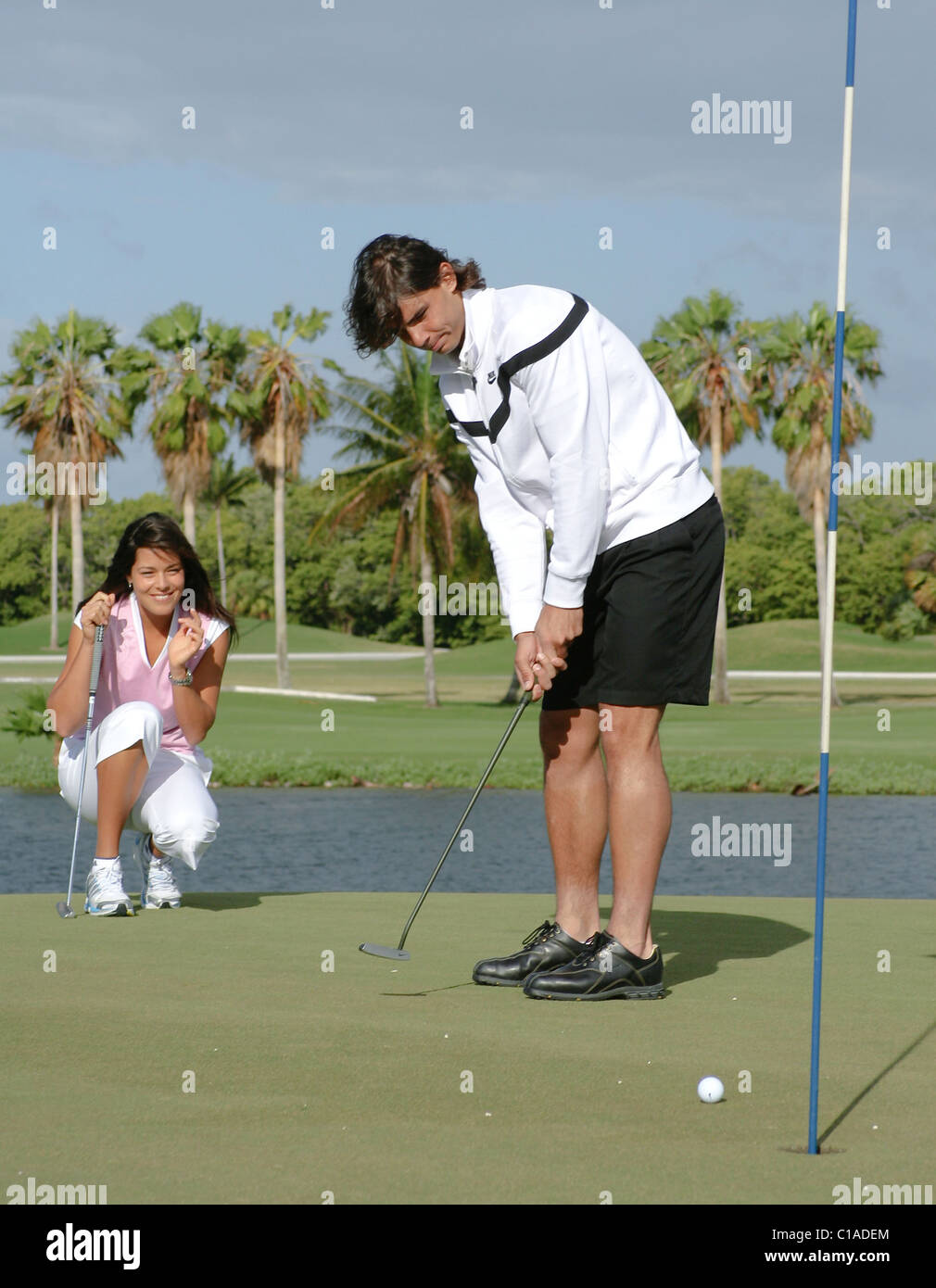Rafael Nadal And Ana Ivanovic At A Photocall On The 11th Hole At The Crandon Park Golf Course At Key Biscayne Prior To The Stock Photo Alamy