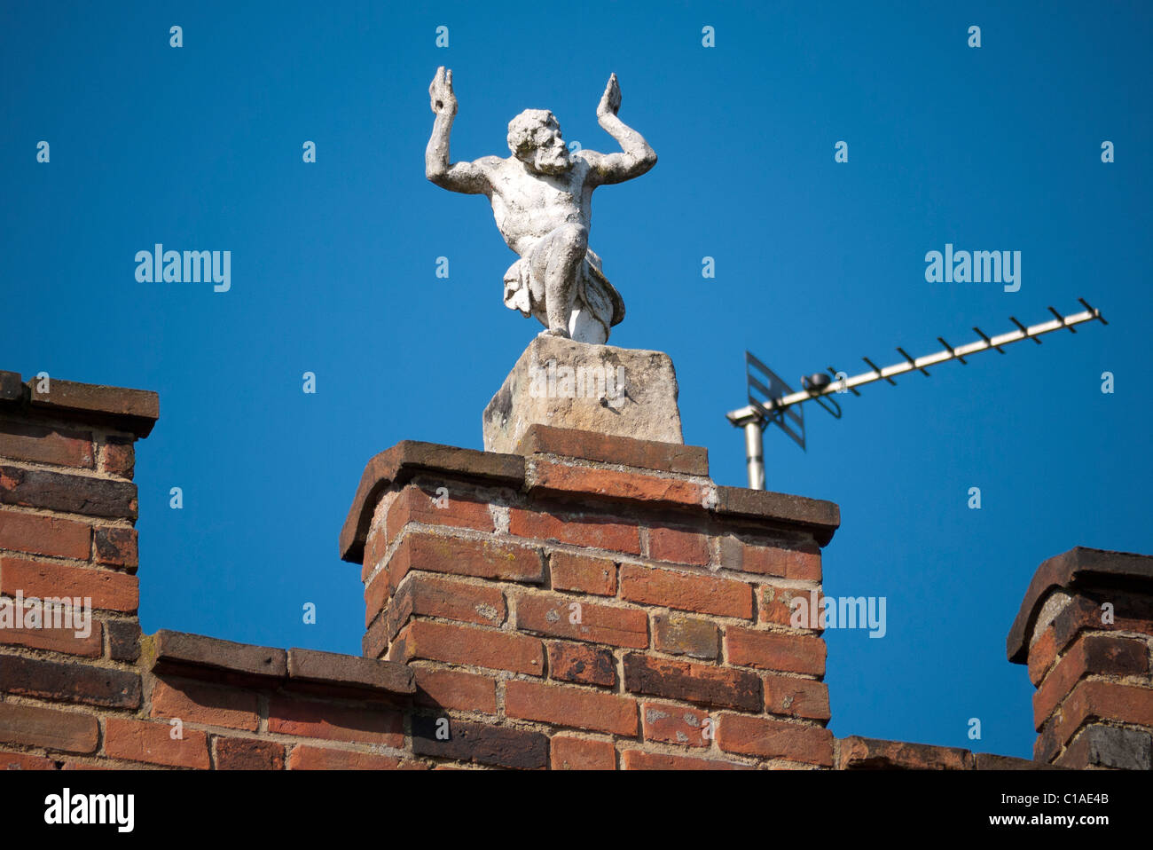 Strange statue on Oxford rooftop Stock Photo