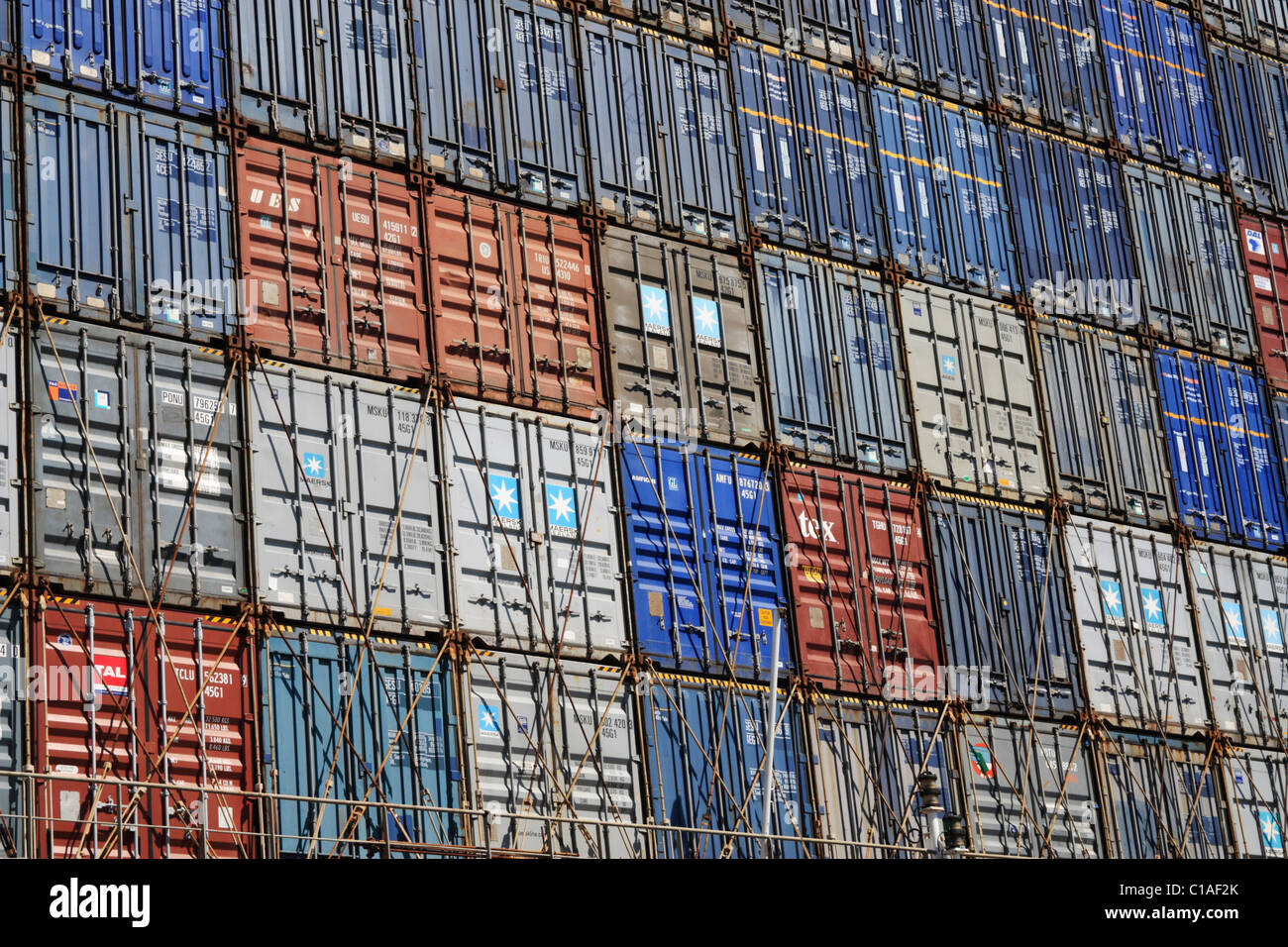 Shipping containers stacked on ship Stock Photo