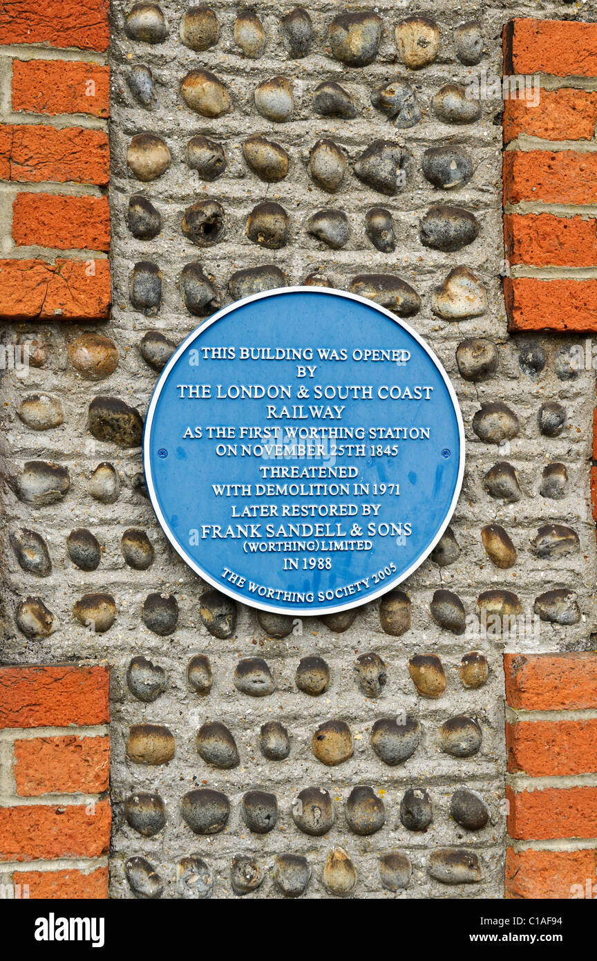 The plaque on the wall of the first Worthing Railway Station which was saved by Frank Sandell and Sons Stock Photo