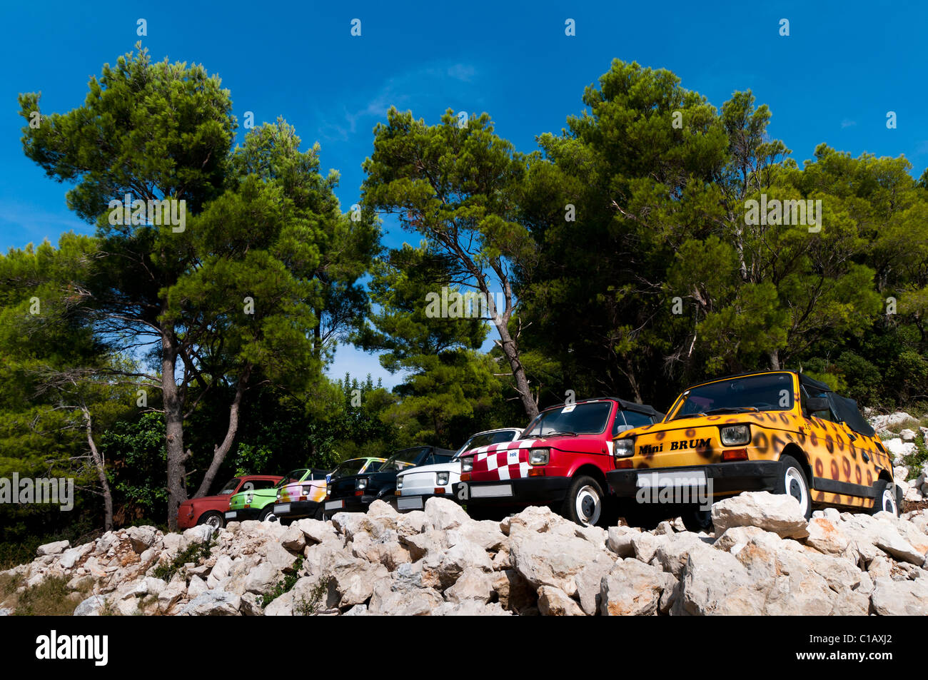 Old cars renovated and painted in bright colors Stock Photo