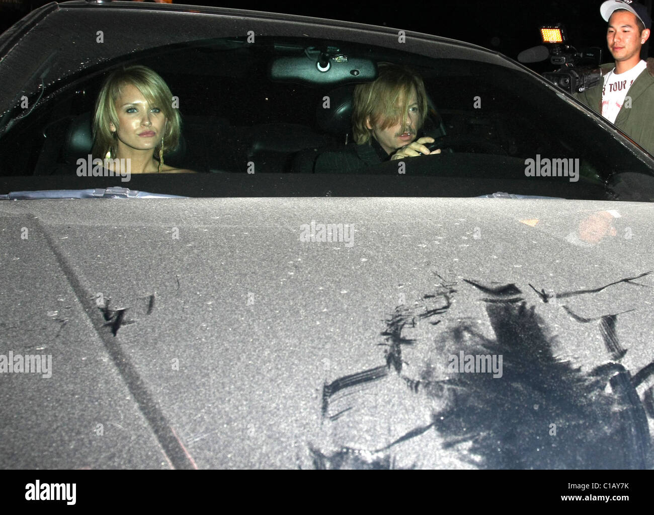 Nicky Whelan and David Spade leaving Elton John's Birthday party at