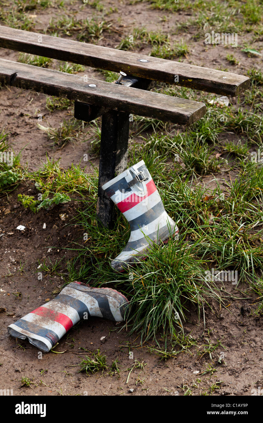 colourful wellington boots left by a bench Stock Photo - Alamy