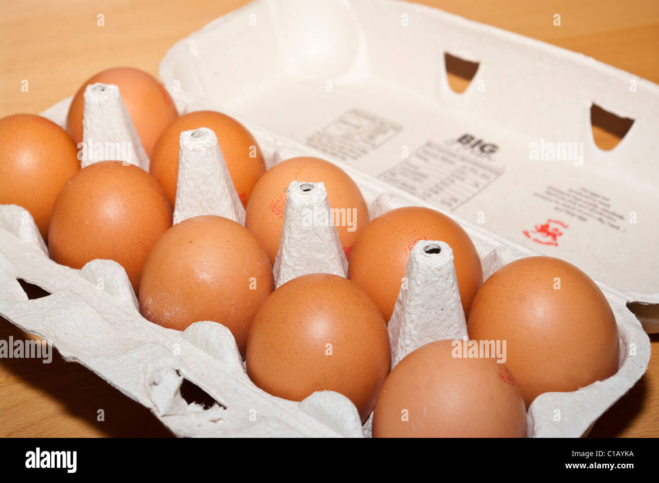 Open Box of 10 Chickens Eggs Stock Photo