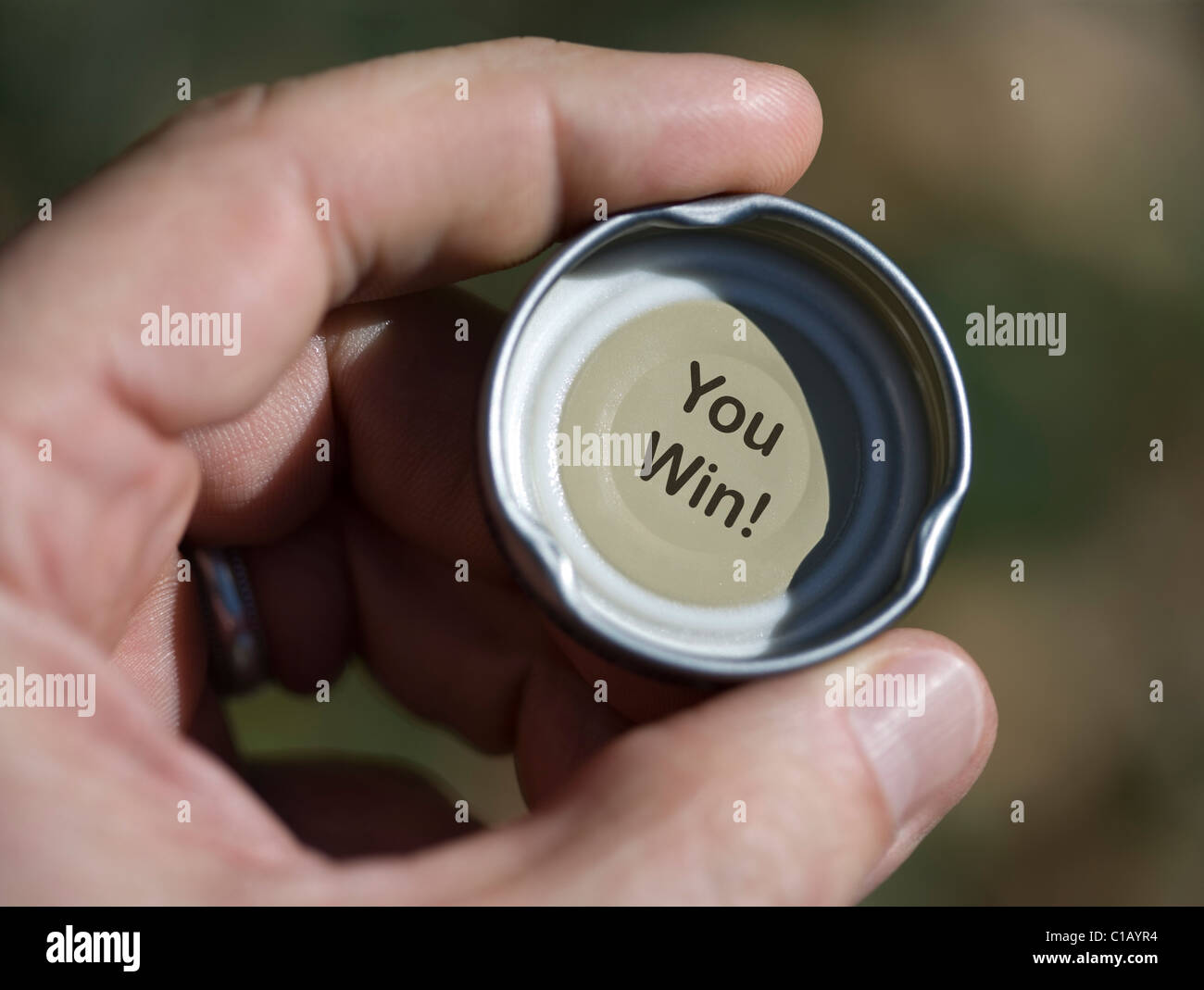 Inside of a bottle cap and the words, You Win! Stock Photo