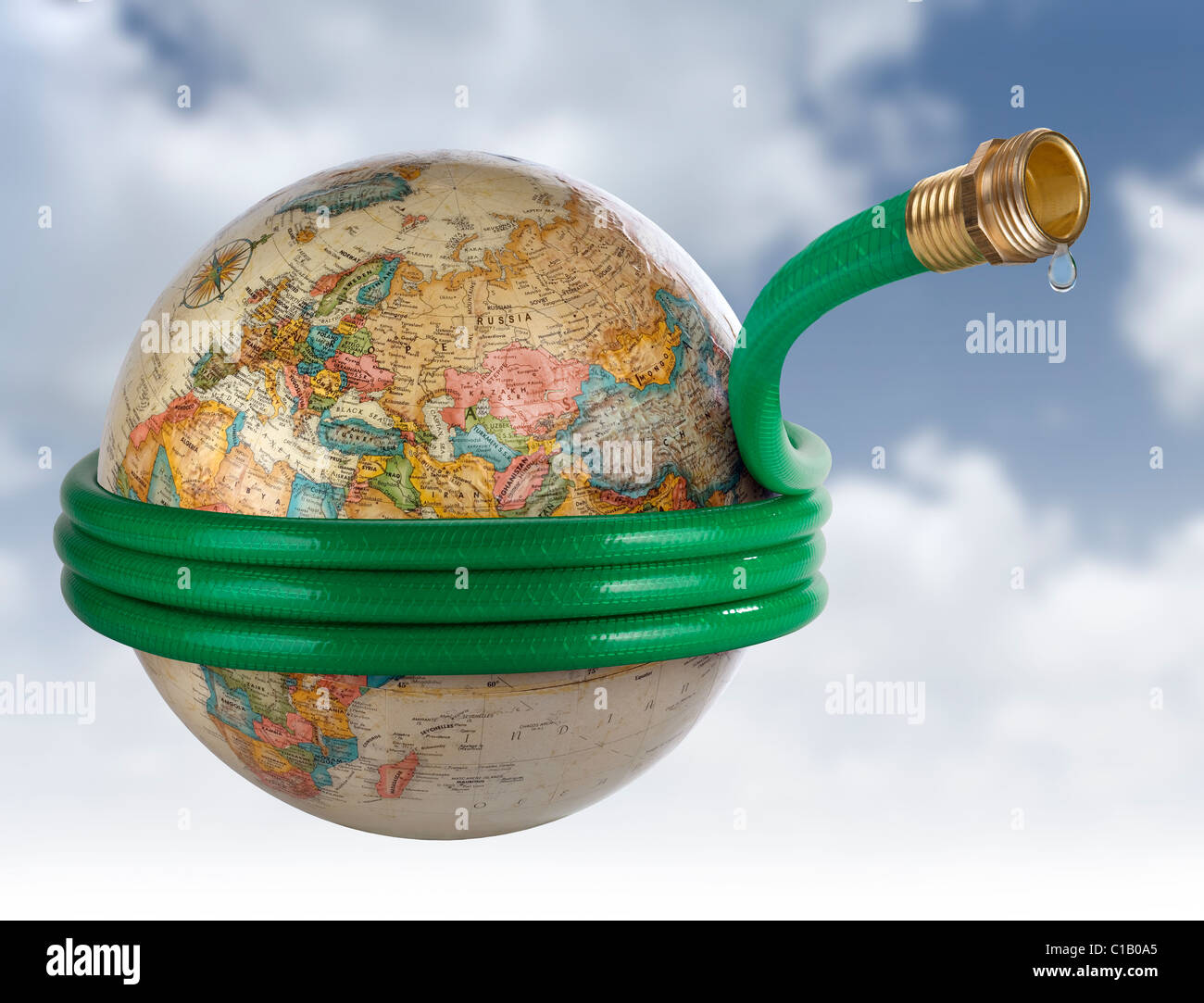 A hose wrapped around a globe in a Global Water Issues concept image. Stock Photo