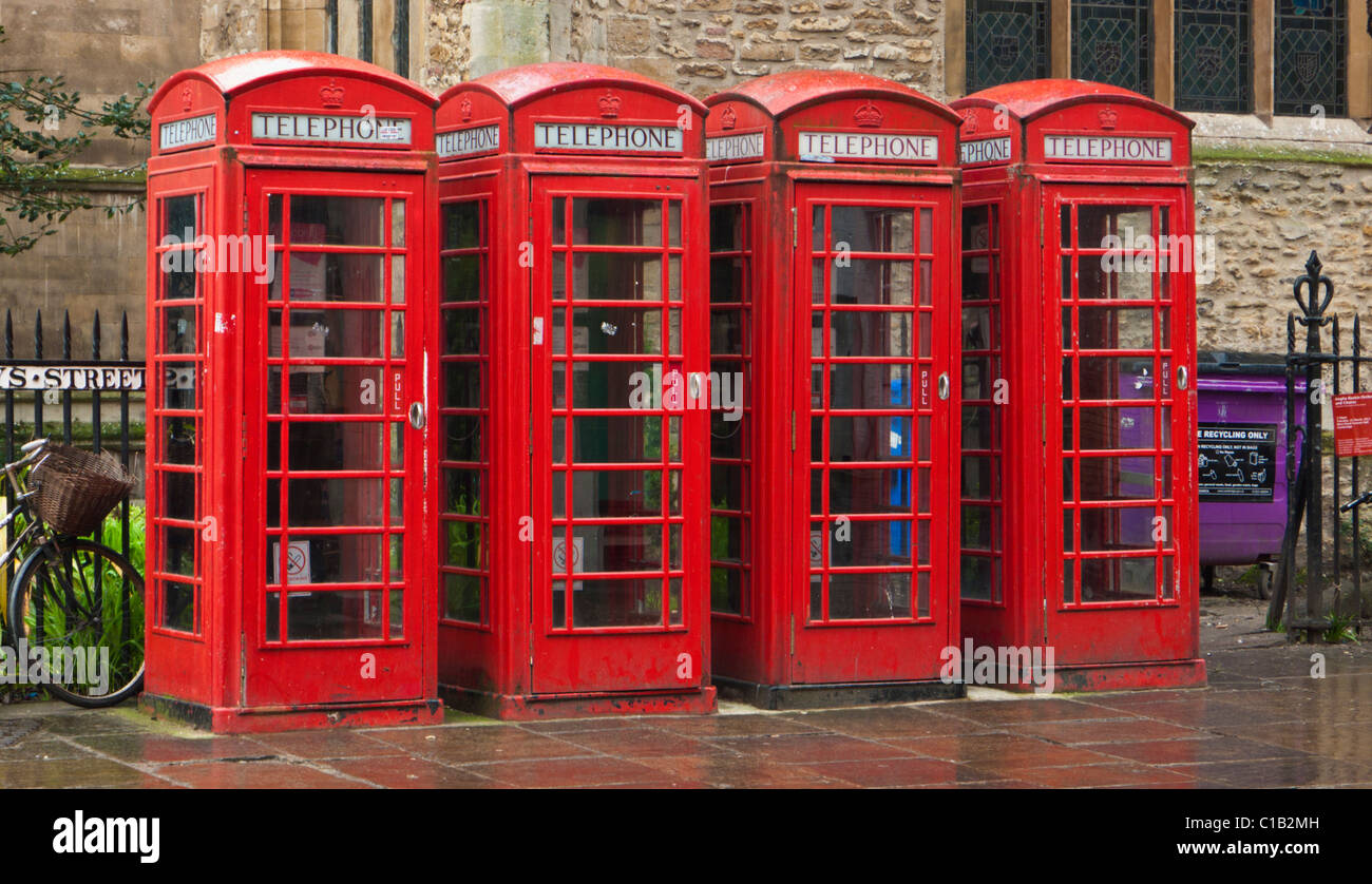 Four red public telephone boxes Cambridge city centre Cambridgeshire England UK GB EU Europe Stock Photo