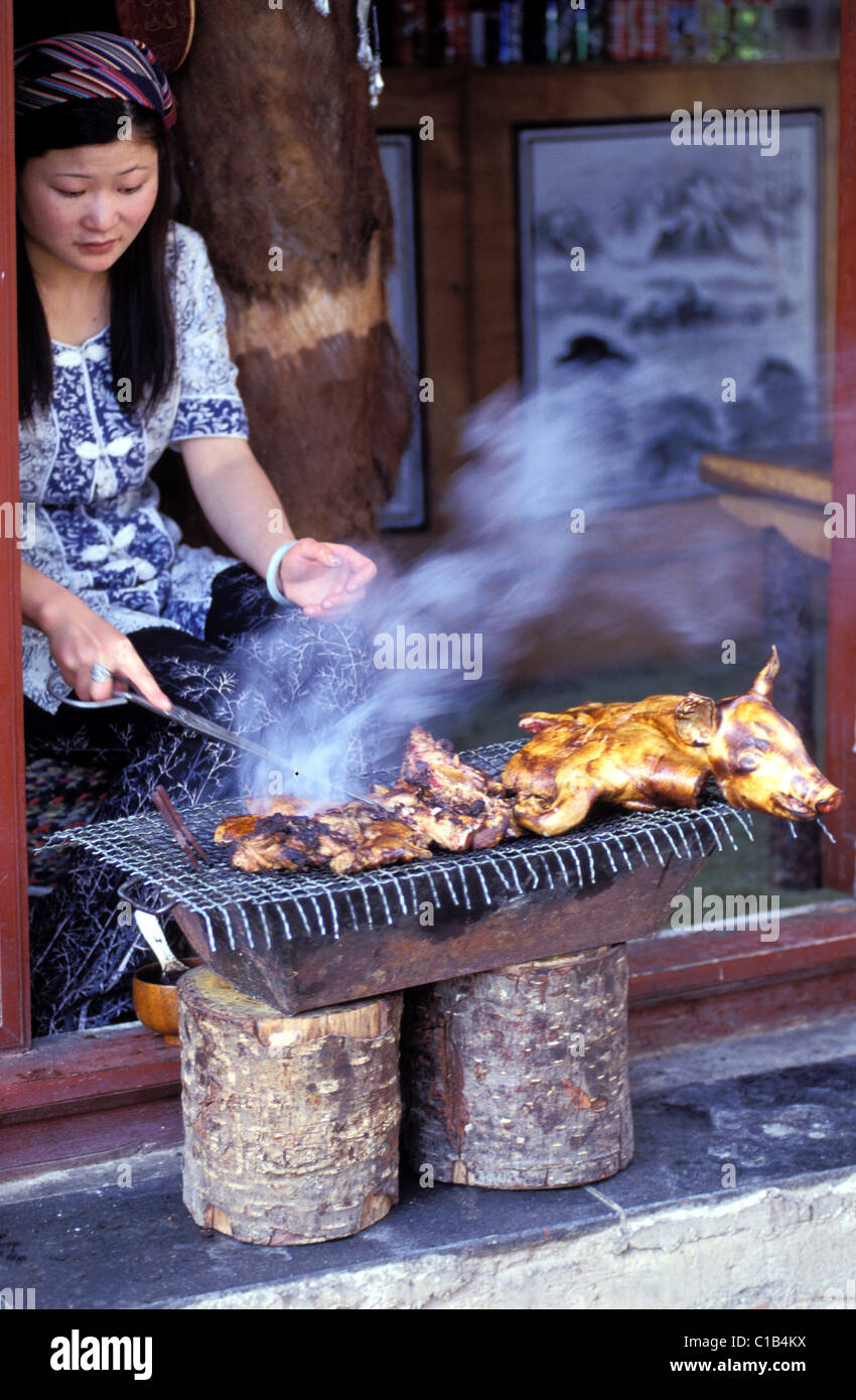 China, Yunnan province, Lijiang, shop, grilled pork Stock Photo - Alamy