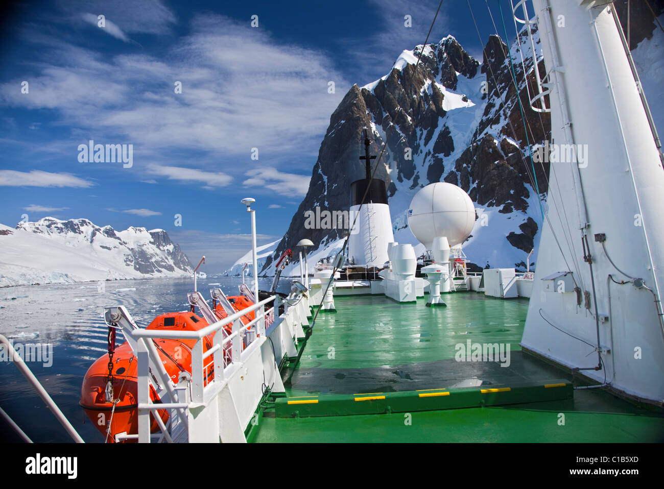 MS Expedition sailing through the Lemaire Channel, Antarctic Peninsula Stock Photo