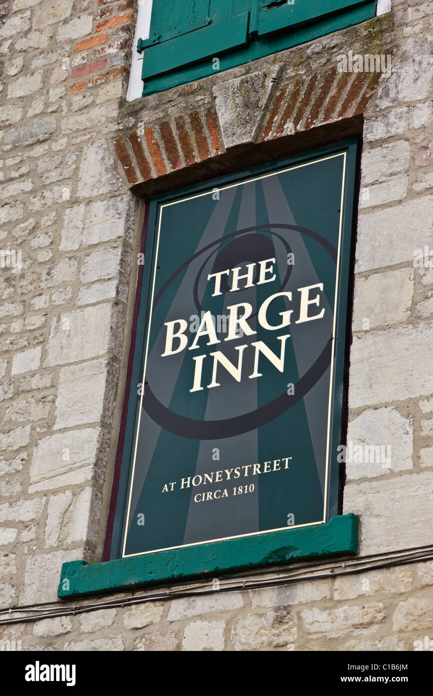 Pub sign of The Barge Inn - a traditional British pub in Honeystreet near Pewsey in Wiltshire famous for crop circles Stock Photo